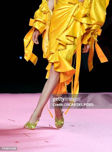 Model displays an outfit of Spanish designer Maria Escote Spring/Summer 2019 collection during the Madrid's Mercedes Benz Fashion Week on July 08,...