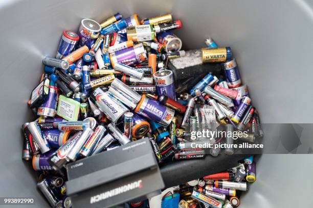 June 2018, Hanover, Germany: Batteries are in a disposal bin at a recycling center in Hanover. Whether button cell from the hearing aid or...