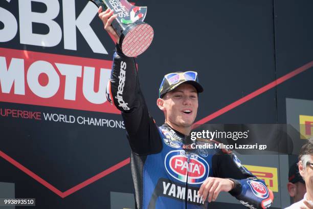 Federico Caricasulo of Italy and GRT Yamaha Official WorldSSP Team celebrates the victory on the podium at the end of the Supersport race during the...