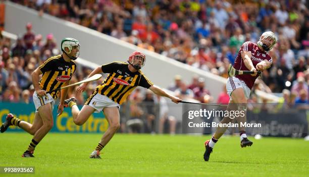 Thurles , Ireland - 8 July 2018; Joe Canning of Galway gets a shot in ahead of Paddy Deegan, left, and James Maher of Kilkenny during the Leinster...