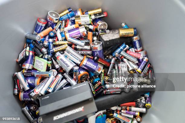 June 2018, Hanover, Germany: Batteries are in a disposal bin at a recycling center in Hanover. Whether button cell from the hearing aid or...