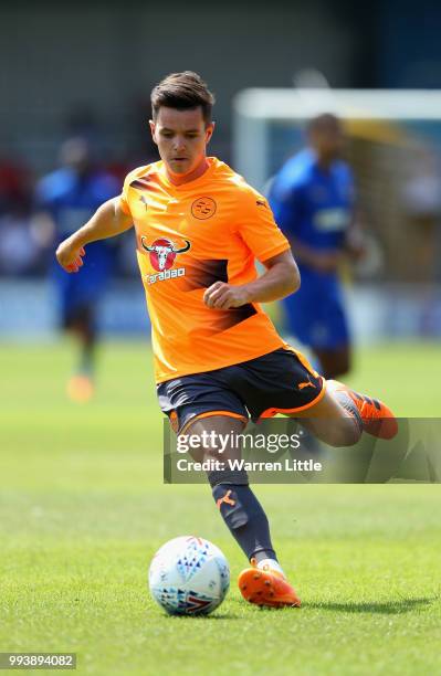 Liam Kelly of Reading FC in action during a pre-season friendly match between AFC Wimbeldon and Reading at The Cherry Red Records Stadium on July 7,...