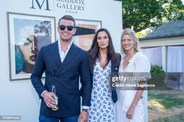 Chris Wilson, Lily Fortescue and Charlotte Baer attend the Hamptons Magazine Cover Star Rose Byrne Celebration Presented By Lalique Along With Maddox...