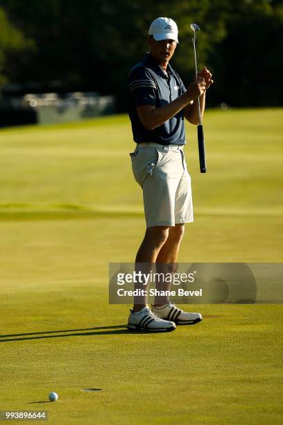 Broc Everett of Augusta reacts to a missed putt on the 18th green during the Division I Men's Golf Individual Stroke Play Championship held at the...
