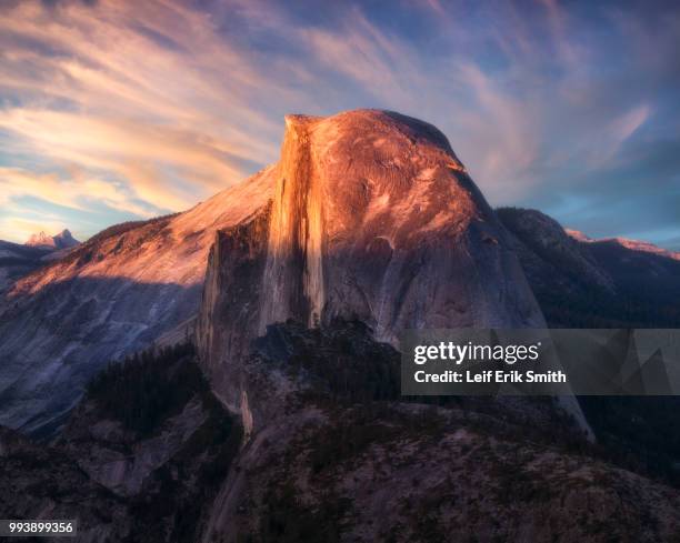 a mountain peak at sunset. - dale smith stock pictures, royalty-free photos & images