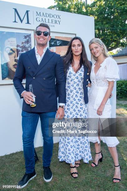 Chris Wilson, Lily Fortescue and Charlotte Baer attend the Hamptons Magazine Cover Star Rose Byrne Celebration Presented By Lalique Along With Maddox...