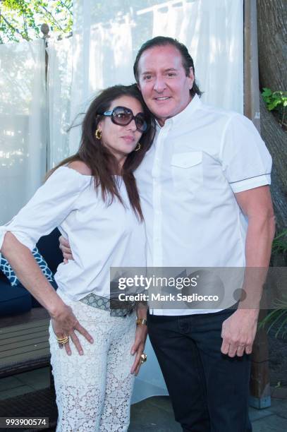 Karen Frankel and Larry Scott attend the Hamptons Magazine Cover Star Rose Byrne Celebration Presented By Lalique Along With Maddox Gallery at...