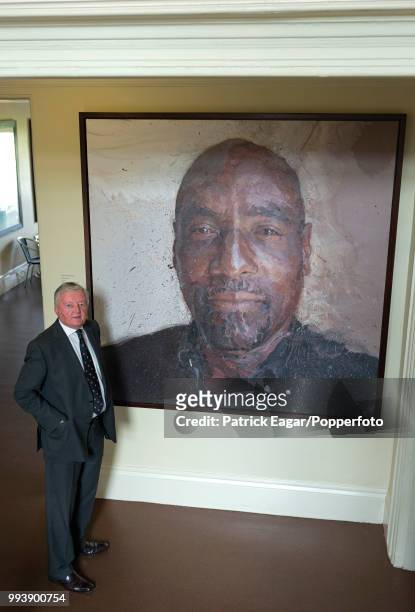 The next President of the MCC, David Morgan, who begins his term in office from October 2014, photographed next to a portrait of Sir Viv Richards in...