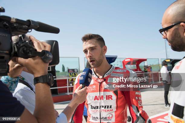 Matteo Ferrari of Italy and Barni Racing Team speaks with journalists in pit after crashed out during the Superstock1000 race during the WorldSBK...