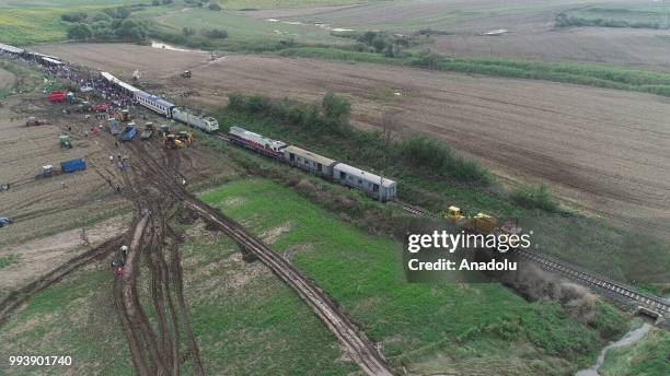 Drone photo shows the scene after several bogies of a passenger train derailed at the Sarilar village of Tekirdags Corlu district on July 8, 2018....