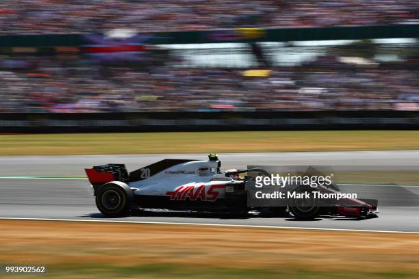 Kevin Magnussen of Denmark driving the Haas F1 Team VF-18 Ferrari on track during the Formula One Grand Prix of Great Britain at Silverstone on July...