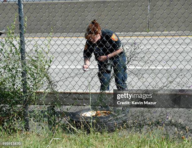 First responder works on the scene of a fatal car accident on Sunrise Highway on July 5, 2018 in West Babylon, New York. According to police, a...
