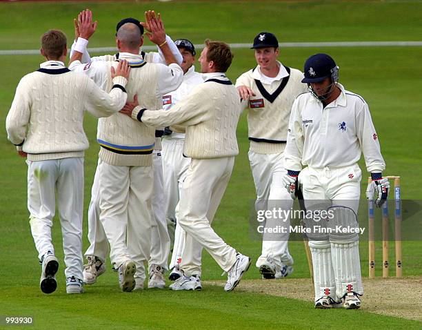 Matthew Walker of Kent heads back to the pavilion after he was caught behind off Craig White of Yorkshire for 19 on the third day of the CricInfo...