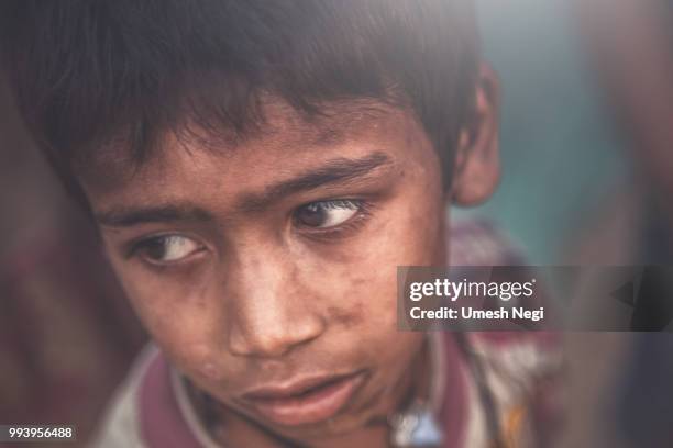 a portrait of a poor child from india - underweight stock pictures, royalty-free photos & images