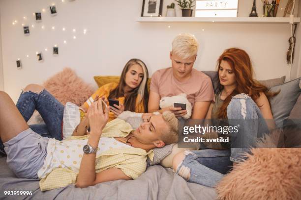 teenagers life - college dorm party stock pictures, royalty-free photos & images