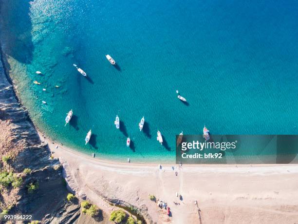 aerial view of a yachts on amazing olympos beach - antalya stock pictures, royalty-free photos & images