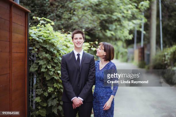 portrait of mother and son for prom night - prom photo imagens e fotografias de stock