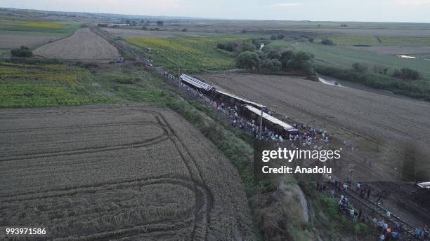 Drone photo shows the scene after several bogies of a passenger train derailed at the Sarilar village of Tekirdags Corlu district on July 8, 2018....