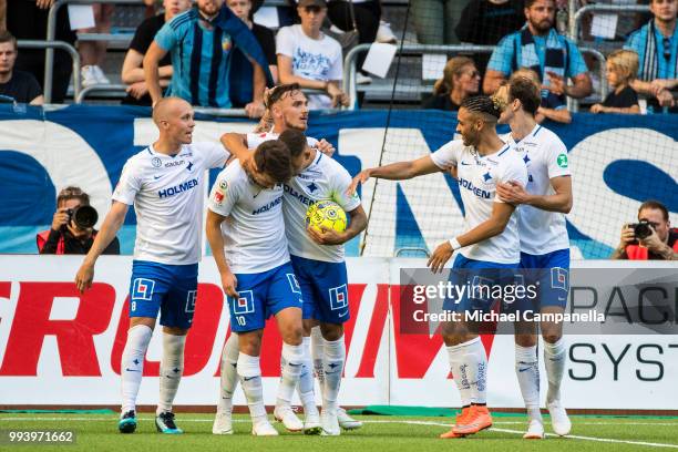 Simon Skrabb and IFK Norrkoping teammates celebrate scoring the 1-1 goal during an Allsvenskan match between Djurgardens IF and IFK Norrkoping at...