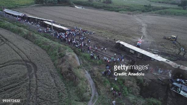 Drone photo shows the scene after several bogies of a passenger train derailed at the Sarilar village of Tekirdags Corlu district on July 8, 2018....