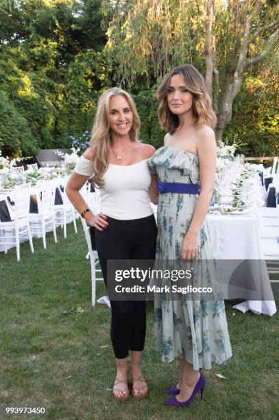 Andrea Correale and Rose Byrne attend the Hamptons Magazine Cover Star Rose Byrne Celebration Presented By Lalique Along With Maddox Gallery at...