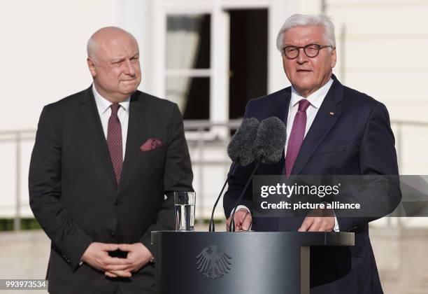 July 2018, Germany, Berlin: German President Frank-Walter Steinmeier and George Tsereteli, president of the Parliamentary Assembly of the OSZE,...