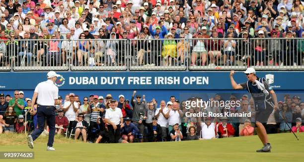 Russell Knox of Scotland celebrates his birdie on the 18th green during the final round of the Dubai Duty Free Irish Open at Ballyliffin Golf Club on...