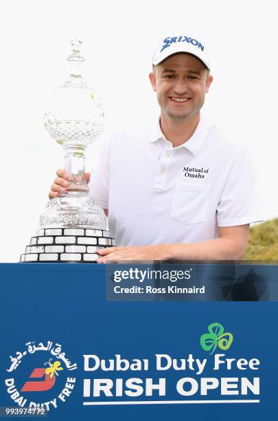 Russell Knox of Scotland with the winners trophy after his play-off win in the final round of the Dubai Duty Free Irish Open at Ballyliffin Golf Club...