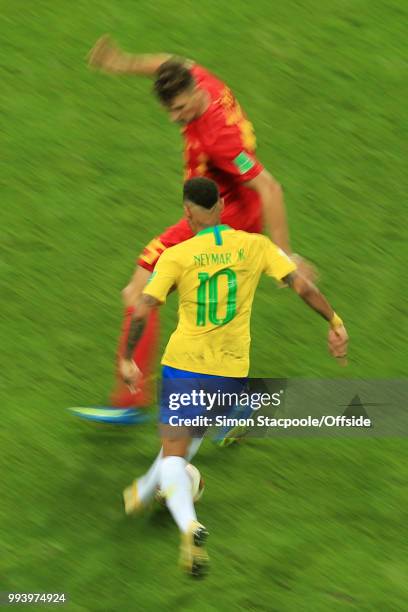 Neymar of Brazil runs at Thomas Meunier of Belgium during the 2018 FIFA World Cup Russia Quarter Final match between Brazil and Belgium at Kazan...