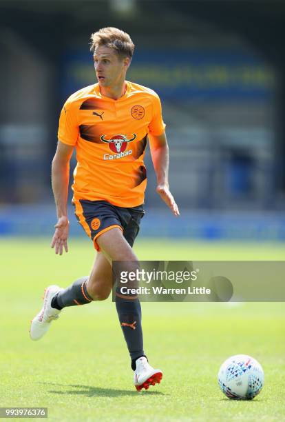 David Edwards of Readington FC in action during a pre-season friendly match between AFC Wimbeldon and Reading at The Cherry Red Records Stadium on...