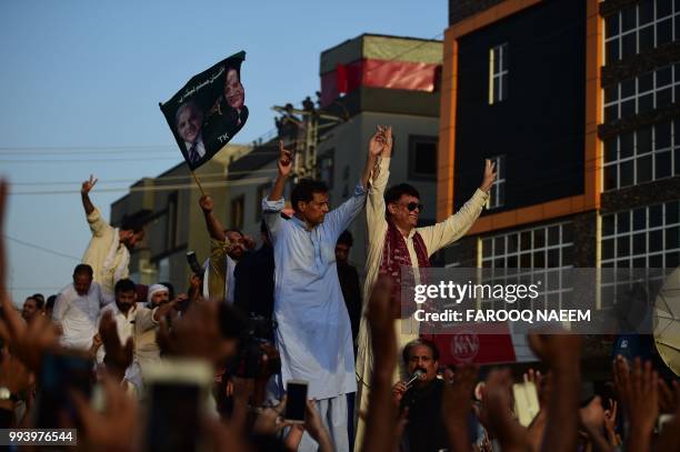 Pakistan's former Prime Minister Nawaz Sharif's son-in-law and PML-N leader Captain Safdar speaks to supporters prior to presenting himself for...