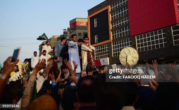 Pakistan's former Prime Minister Nawaz Sharif's son-in-law and PML-N leader Captain Safdar speaks to supporters prior to presenting himself for...
