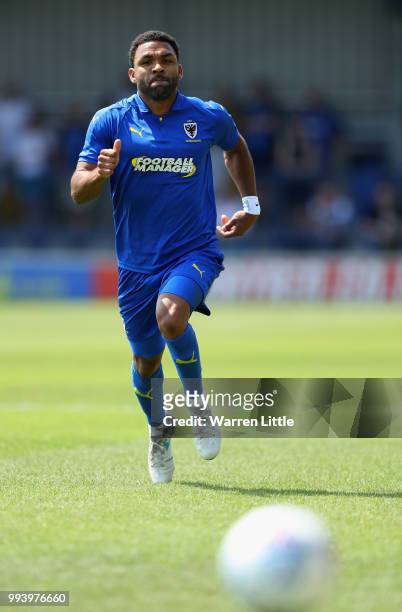 Andy Barcham of AFC Wimbledon in action during a pre-season friendly match between AFC Wimbeldon and Reading at The Cherry Red Records Stadium on...
