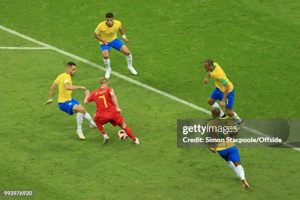 Kevin De Bruyne of Belgium is surrounded by Brazilian opponents during the 2018 FIFA World Cup Russia Quarter Final match between Brazil and Belgium...