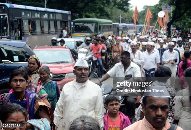 Traffic were stopped by Pune Police on JM road as Pilgrims arrive carrying palki of Saint Dnyaneshwar for annual pilgrimage from Alandi towards...