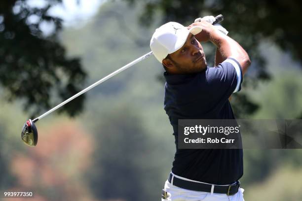 Harold Varner III tees off on the second hole during the final round of A Military Tribute At The Greenbrier held at the Old White TPC course on July...