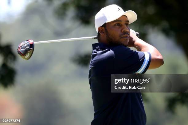Harold Varner III tees off on the second hole during the final round of A Military Tribute At The Greenbrier held at the Old White TPC course on July...