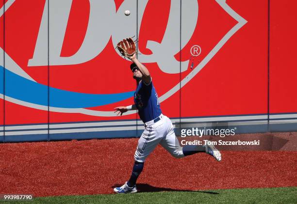 Randal Grichuk of the Toronto Blue Jays makes a running catch in the sixth inning during MLB game action against the New York Yankees at Rogers...