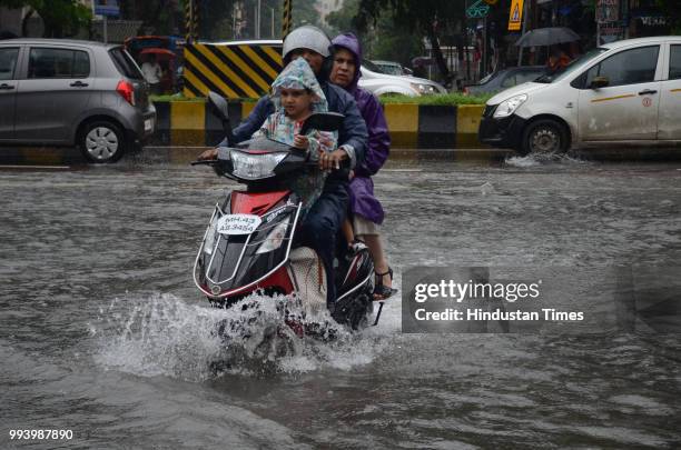Heavy rains cause water logging at Sector -10 Vashi on July 7, 2018 in Navi Mumbai, India. One person was killed and normal life remained disrupted...