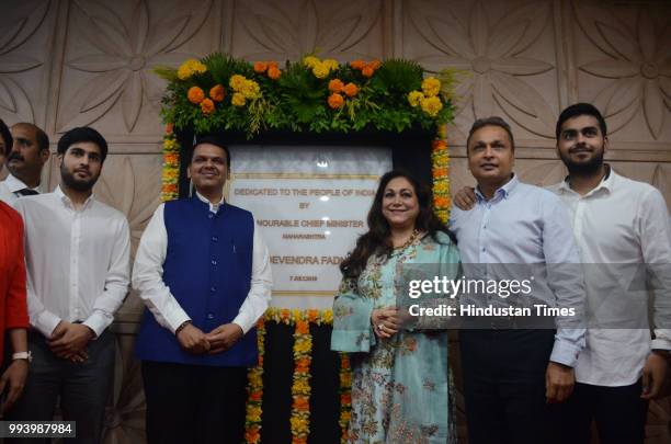 Maharashtra Chief Minister Devendra Fadnavis with Anil Ambani Chairman of Reliance Anil Dhirubhai Ambani Group and his wife Tina Ambani and their...
