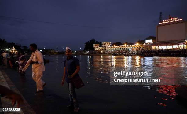 Devotees also known as warkaris on Alandi Ghat bank of Indrayani river where Gyaneshwar took his Samadhi during annual pilgrimage called the Wari...