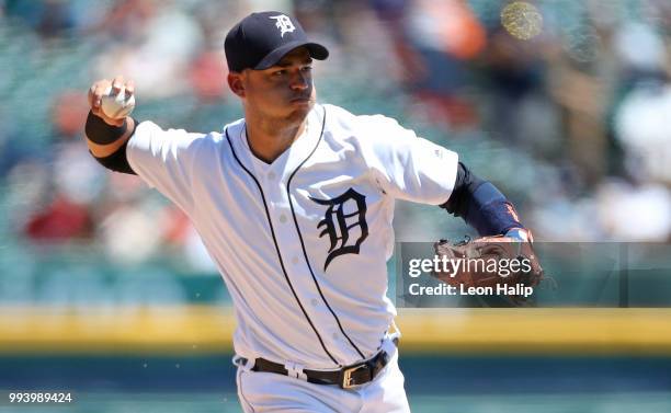 Jose Iglesias of the Detroit Tigers makes the throw to first base during the sixth inning of the game against the Texas Rangers at Comerica Park on...