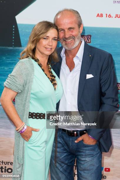 Tina Ruland and her husband Claus G. Oeldorp attend the 'Hotel Transsilvanien 3' premiere at CineStar on July 8, 2018 in Berlin, Germany.