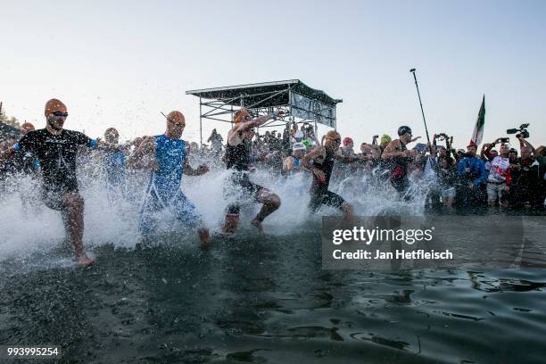 Athletes compete during the swim leg at the Mainova IRONMAN European Championship on July 8, 2018 in Frankfurt am Main, Germany.