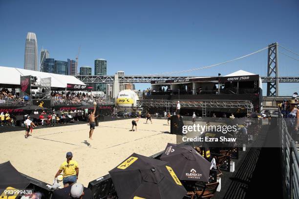 Sean Rosenthal and Chase Budinger play in the near court against Tim Bomgren and Chaim Schalk in the semifinals at the AVP San Francisco Open at Pier...