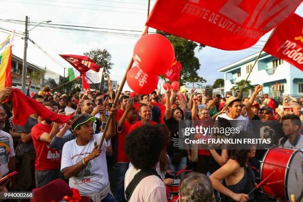 Supporters of Brazilian former president Luiz Inacio Lula da Silva demonstrate outside the Federal Police where he is detainee in Curitiba, Parana...