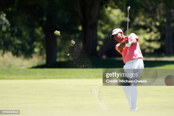 Anirban Lahiri of India hits his second shot on the first hole during the final round of A Military Tribute At The Greenbrier held at the Old White...
