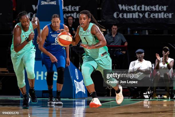 Shavonte Zellous of the New York Liberty handles the ball against Dallas Wings on July 8, 2018 at Westchester County Center in White Plains, New...