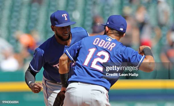 Jurickson Profar and Rougned Odor of the Texas Rangers celebrate a win over the Detroit Tigers at Comerica Park on July 8, 2018 in Detroit, Michigan....