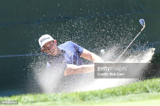 Scott Stallings hits out of the bunker on the 18th hole during the final round of A Military Tribute At The Greenbrier held at the Old White TPC...